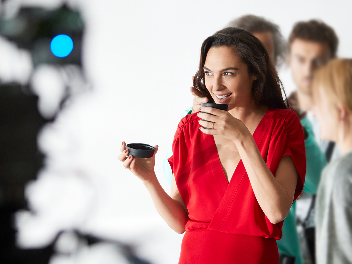 Gal Gador for Revlon  - Behind the scene shot, sipping Coffee